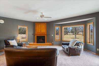 Beat the Spring Rush! Enjoy the serene beauty of country living on RiverEdge Golf Course in Wisconsin - for sale on GolfHomes.com, golf home, golf lot