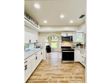 Welcome to this Florida gem in the heart of Country Club Estates on St. Lucie Trail Golf Club in Florida - for sale on GolfHomes.com, golf home, golf lot