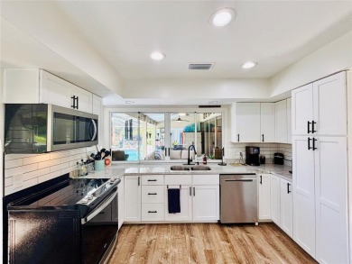Welcome to this Florida gem in the heart of Country Club Estates on St. Lucie Trail Golf Club in Florida - for sale on GolfHomes.com, golf home, golf lot