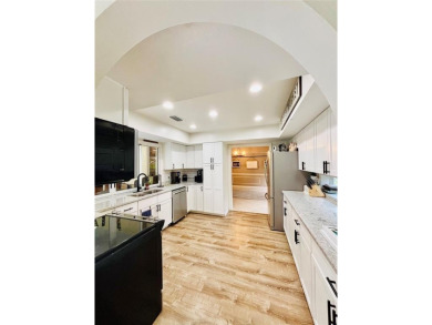 Welcome to this Florida gem in the heart of Country Club Estates on St. Lucie Trail Golf Club in Florida - for sale on GolfHomes.com, golf home, golf lot