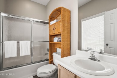 Located on the serene salt marsh with sweeping deep-water views on Ocean Creek Golf Course in South Carolina - for sale on GolfHomes.com, golf home, golf lot