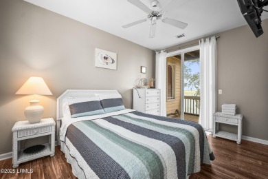 Located on the serene salt marsh with sweeping deep-water views on Ocean Creek Golf Course in South Carolina - for sale on GolfHomes.com, golf home, golf lot