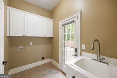 Luxury! Location! Privacy! Welcome to Mirror Lake's prestigious on Mirror Lake Golf Club in Georgia - for sale on GolfHomes.com, golf home, golf lot