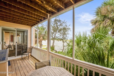 Located on the serene salt marsh with sweeping deep-water views on Ocean Creek Golf Course in South Carolina - for sale on GolfHomes.com, golf home, golf lot