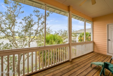 Located on the serene salt marsh with sweeping deep-water views on Ocean Creek Golf Course in South Carolina - for sale on GolfHomes.com, golf home, golf lot