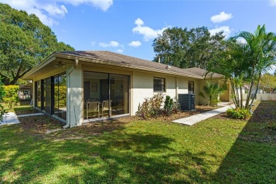 Sited in the desirable golfing community of Cypresswood Golf & on Cypresswood Golf and Country Club in Florida - for sale on GolfHomes.com, golf home, golf lot