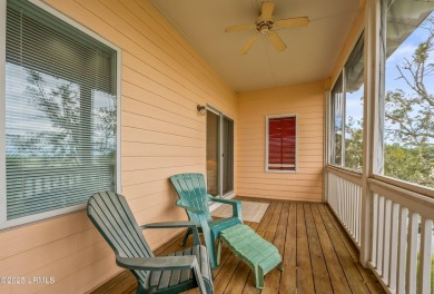 Located on the serene salt marsh with sweeping deep-water views on Ocean Creek Golf Course in South Carolina - for sale on GolfHomes.com, golf home, golf lot