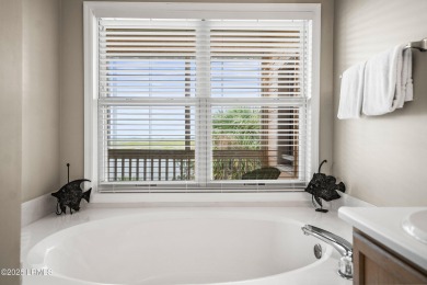 Located on the serene salt marsh with sweeping deep-water views on Ocean Creek Golf Course in South Carolina - for sale on GolfHomes.com, golf home, golf lot