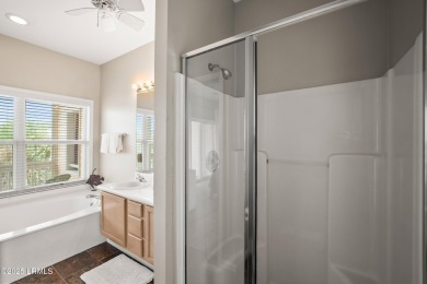 Located on the serene salt marsh with sweeping deep-water views on Ocean Creek Golf Course in South Carolina - for sale on GolfHomes.com, golf home, golf lot
