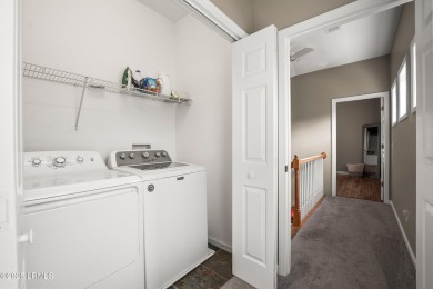 Located on the serene salt marsh with sweeping deep-water views on Ocean Creek Golf Course in South Carolina - for sale on GolfHomes.com, golf home, golf lot