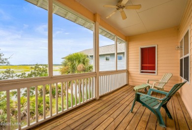 Located on the serene salt marsh with sweeping deep-water views on Ocean Creek Golf Course in South Carolina - for sale on GolfHomes.com, golf home, golf lot