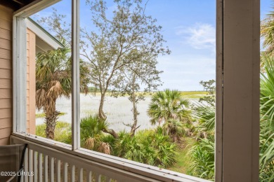 Located on the serene salt marsh with sweeping deep-water views on Ocean Creek Golf Course in South Carolina - for sale on GolfHomes.com, golf home, golf lot