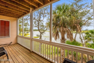 Located on the serene salt marsh with sweeping deep-water views on Ocean Creek Golf Course in South Carolina - for sale on GolfHomes.com, golf home, golf lot