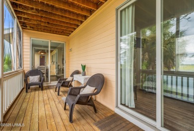 Located on the serene salt marsh with sweeping deep-water views on Ocean Creek Golf Course in South Carolina - for sale on GolfHomes.com, golf home, golf lot