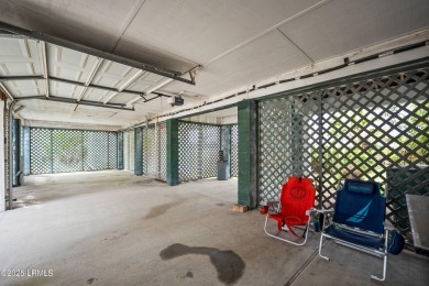Located on the serene salt marsh with sweeping deep-water views on Ocean Creek Golf Course in South Carolina - for sale on GolfHomes.com, golf home, golf lot