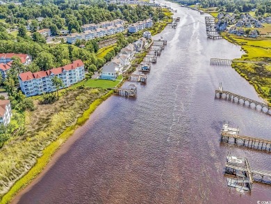 This one is a must-see! Wake up every morning to stunning views on The Valley At Eastport in South Carolina - for sale on GolfHomes.com, golf home, golf lot