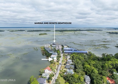 Easy to show!Located on the serene salt marsh with sweeping on Ocean Creek Golf Course in South Carolina - for sale on GolfHomes.com, golf home, golf lot
