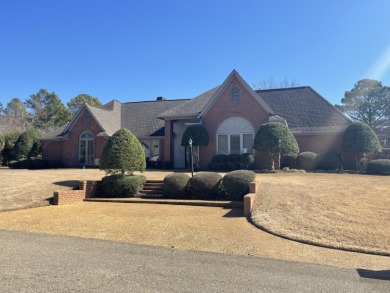 Beautiful home located just off the 14th hole on the Tupelo on Tupelo Country Club in Mississippi - for sale on GolfHomes.com, golf home, golf lot