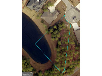 Build your dream home on this beautiful 0.65-acre lakefront lot on The Club At Osprey Cove in Georgia - for sale on GolfHomes.com, golf home, golf lot