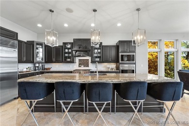 Welcome to 764 Via Del Lago in the prestigious Porto Cima on The Club At Porto Cima in Missouri - for sale on GolfHomes.com, golf home, golf lot