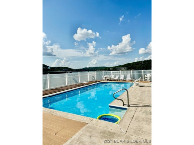 Are you looking for a lakefront condo on the quieter side of the on Lake Valley Country Club in Missouri - for sale on GolfHomes.com, golf home, golf lot