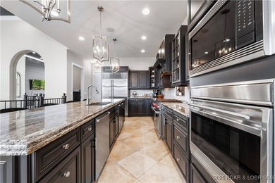 Welcome to 764 Via Del Lago in the prestigious Porto Cima on The Club At Porto Cima in Missouri - for sale on GolfHomes.com, golf home, golf lot