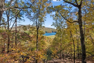 Experience tranquility and breathtaking views at this on Big Canoe Golf Club - Cherokee in Georgia - for sale on GolfHomes.com, golf home, golf lot