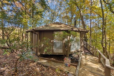 Experience tranquility and breathtaking views at this on Big Canoe Golf Club - Cherokee in Georgia - for sale on GolfHomes.com, golf home, golf lot