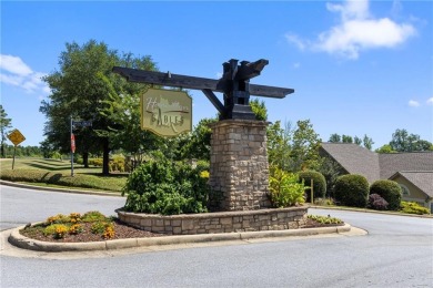 BRAND NEW quartz kitchen countertops, paint throughout & carpet on Saugahatchee Country Club in Alabama - for sale on GolfHomes.com, golf home, golf lot