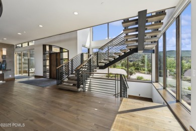 Elevated above the rest, this striking mountain estate claims on Red Ledges Golf Club in Utah - for sale on GolfHomes.com, golf home, golf lot