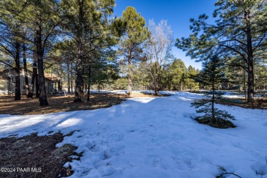 Nestled alongside the picturesque 18th tee box of the renowned on Pinetop Lakes Golf and Country Club in Arizona - for sale on GolfHomes.com, golf home, golf lot