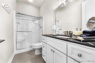 Welcome to 764 Via Del Lago in the prestigious Porto Cima on The Club At Porto Cima in Missouri - for sale on GolfHomes.com, golf home, golf lot