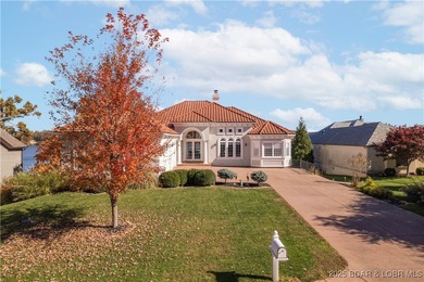 Welcome to 764 Via Del Lago in the prestigious Porto Cima on The Club At Porto Cima in Missouri - for sale on GolfHomes.com, golf home, golf lot