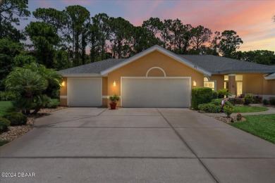 Nestled in the prestigious gated community of Plantation Bay in on Plantation Bay Golf and Country Club in Florida - for sale on GolfHomes.com, golf home, golf lot