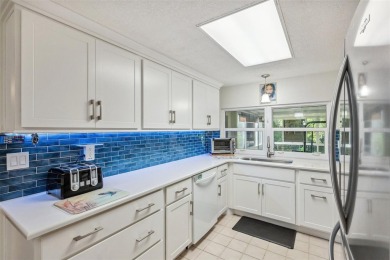 Discover tranquility in this beautifully updated 3-bedroom on Beacon Woods Golf Club in Florida - for sale on GolfHomes.com, golf home, golf lot