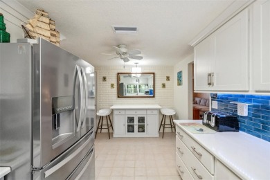 Discover tranquility in this beautifully updated 3-bedroom on Beacon Woods Golf Club in Florida - for sale on GolfHomes.com, golf home, golf lot