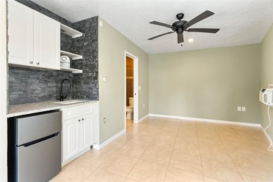 Searching for an IN-LAW SUITE? This is the home you've been on Tuscawilla Country Club in Florida - for sale on GolfHomes.com, golf home, golf lot