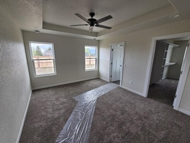 Brand new construction. Located in Hidden Bridge Ranch across on Hidden Bridge Golf Club in Wyoming - for sale on GolfHomes.com, golf home, golf lot
