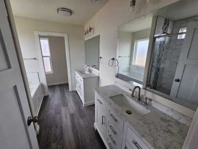 Brand new construction. Located in Hidden Bridge Ranch across on Hidden Bridge Golf Club in Wyoming - for sale on GolfHomes.com, golf home, golf lot