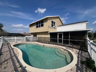 This spacious 2,100+ SqFt POOL home, offers 3 large bedrooms and on San Carlos Golf Club in Florida - for sale on GolfHomes.com, golf home, golf lot