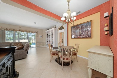 Beautiful 3-bedroom, 2.5-bath home with a large screened-in pool on Hunters Creek Golf Course in Florida - for sale on GolfHomes.com, golf home, golf lot