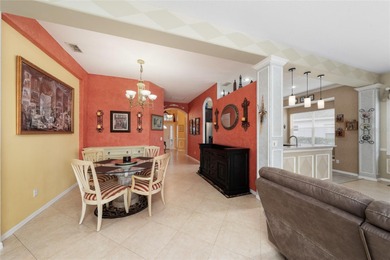 Beautiful 3-bedroom, 2.5-bath home with a large screened-in pool on Hunters Creek Golf Course in Florida - for sale on GolfHomes.com, golf home, golf lot