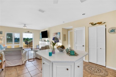 Stunning penthouse, prime location with long gorgeous water on Oak Harbor Country Club in Florida - for sale on GolfHomes.com, golf home, golf lot