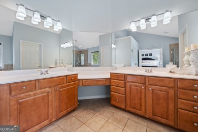 Charming Two-Story Traditional with Private Pond Access on The Golf Club At Bradshaw Farm in Georgia - for sale on GolfHomes.com, golf home, golf lot