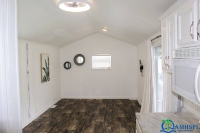 This super fun 1BR/1BA tiny home packs a lot of punch! This home on Lily Lake Golf and RV Resort in Florida - for sale on GolfHomes.com, golf home, golf lot