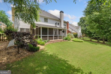 Charming Two-Story Traditional with Private Pond Access on The Golf Club At Bradshaw Farm in Georgia - for sale on GolfHomes.com, golf home, golf lot