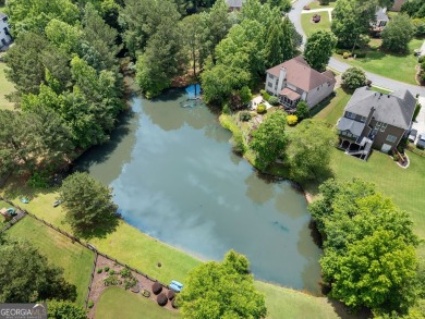 Charming Two-Story Traditional with Private Pond Access on The Golf Club At Bradshaw Farm in Georgia - for sale on GolfHomes.com, golf home, golf lot