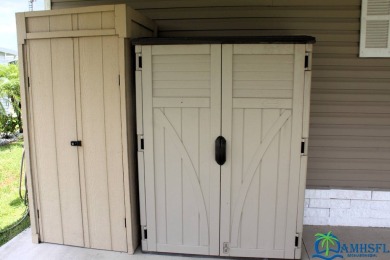 This super fun 1BR/1BA tiny home packs a lot of punch! This home on Lily Lake Golf and RV Resort in Florida - for sale on GolfHomes.com, golf home, golf lot