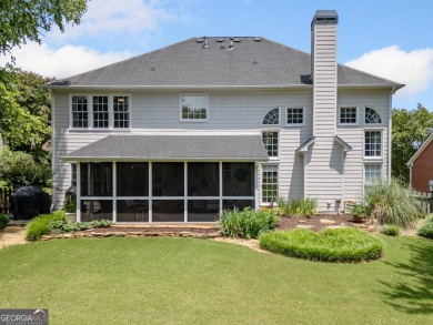 Charming Two-Story Traditional with Private Pond Access on The Golf Club At Bradshaw Farm in Georgia - for sale on GolfHomes.com, golf home, golf lot