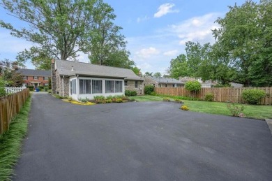 This cape cod style stone beauty in Fairway subdivision is for on Idle Hour Country Club in Kentucky - for sale on GolfHomes.com, golf home, golf lot